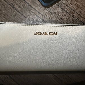 Michael Kors Cream Clutch with Gold Logo